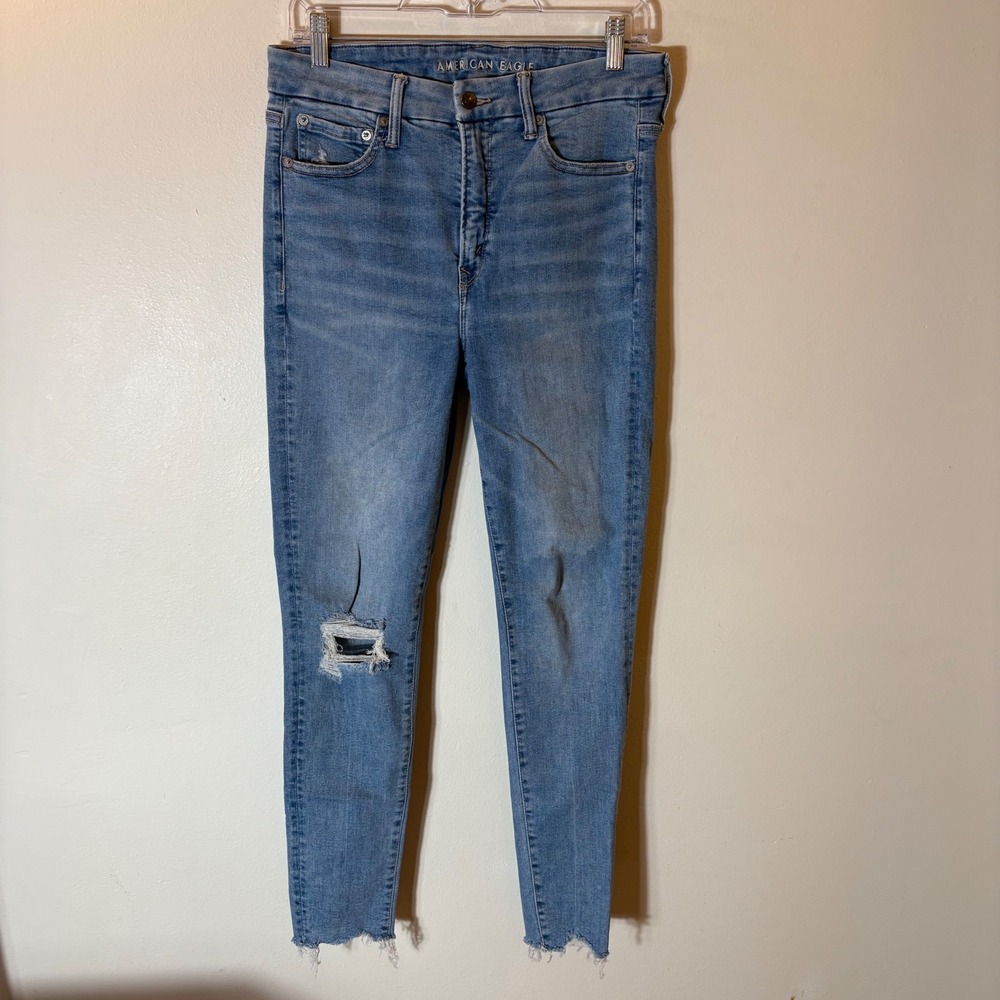 American‎ Eagle Super Hi-Rise Jegging Blue Distressed Raw Hem Jeans Size 8